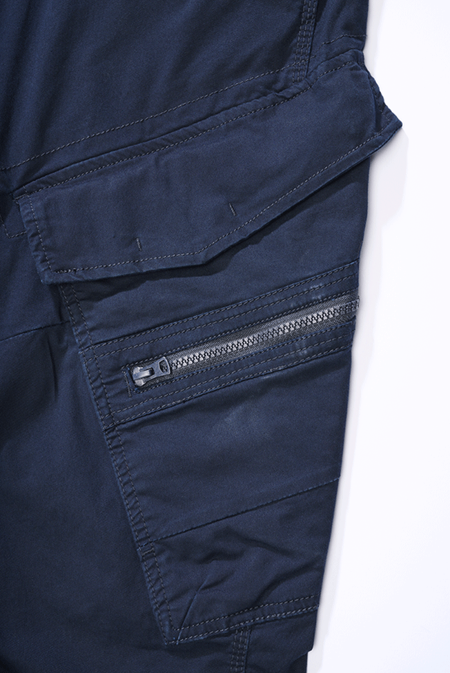 Pantalon Brandit Adven Slim Fit coton extensible assise renforcée six poches et cordon de taille