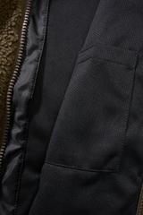 Veste polaire Brandit coupe femme à capuche maille peluche et trois poches à glissière