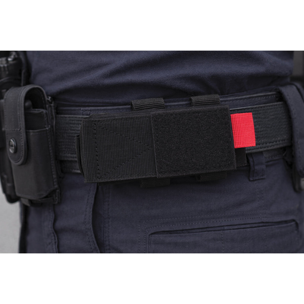 Porte-garrot en polyester attaches MOLLE et passant de ceinturon