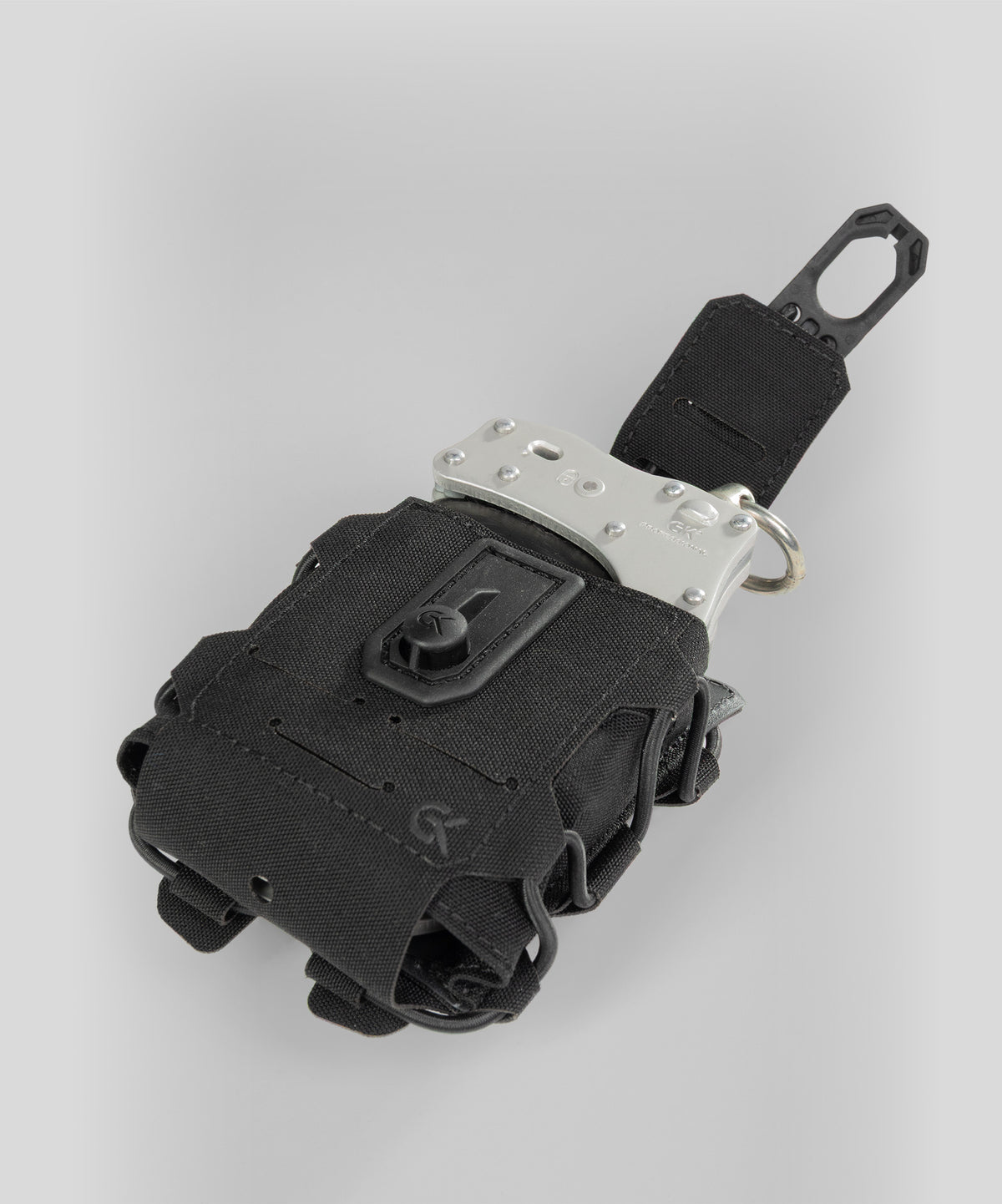 Porte-menottes GK Dutycall à rabat sur platine MOLLE en deux finitions