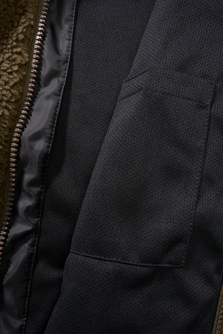 Veste polaire Brandit coupe femme à capuche maille peluche et trois poches à glissière